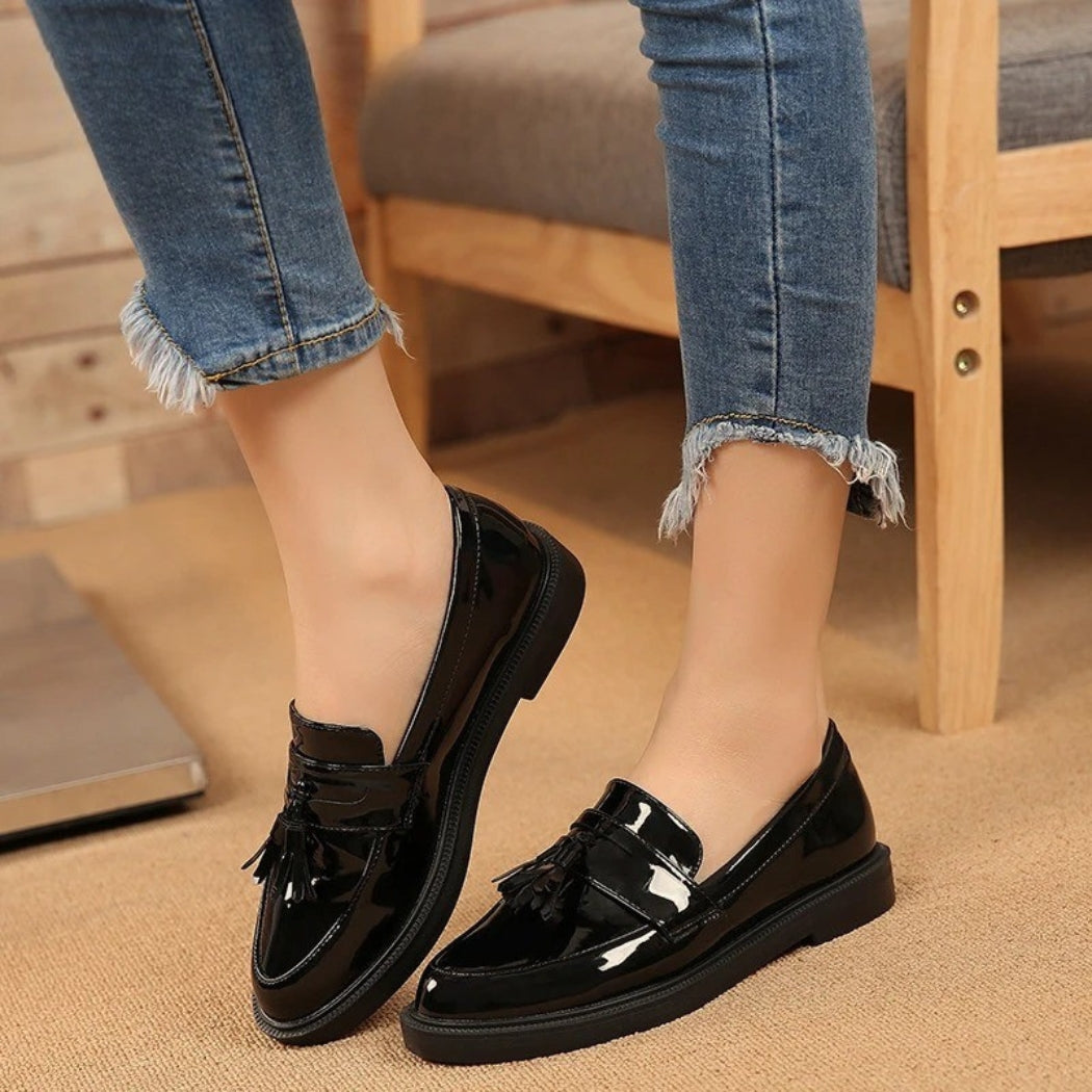 Schwarze Lackoptik-Loafer mit Quaste für Damen