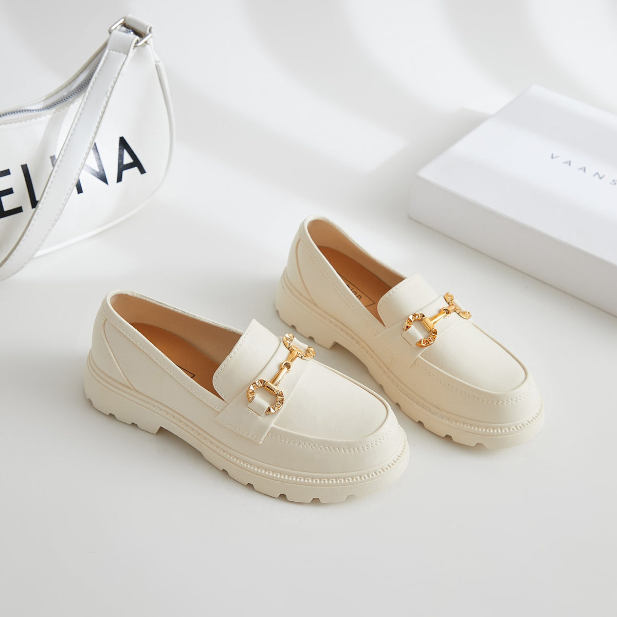 Damen Mokassins mit Plateau und Metallkette