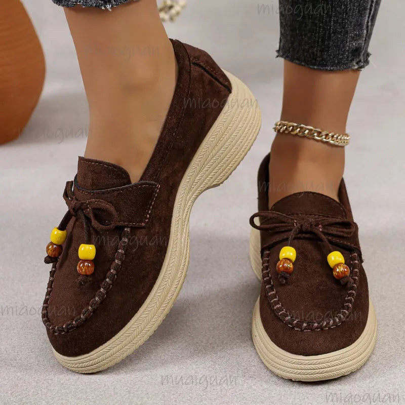 Damen Plateau-Loafer mit Perlenschleife in Schwarz