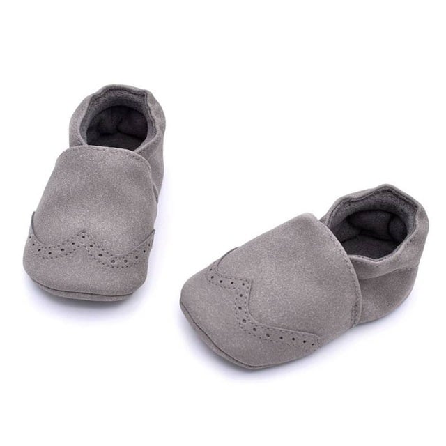 Kleine Kunstleder-Loafer für Babys