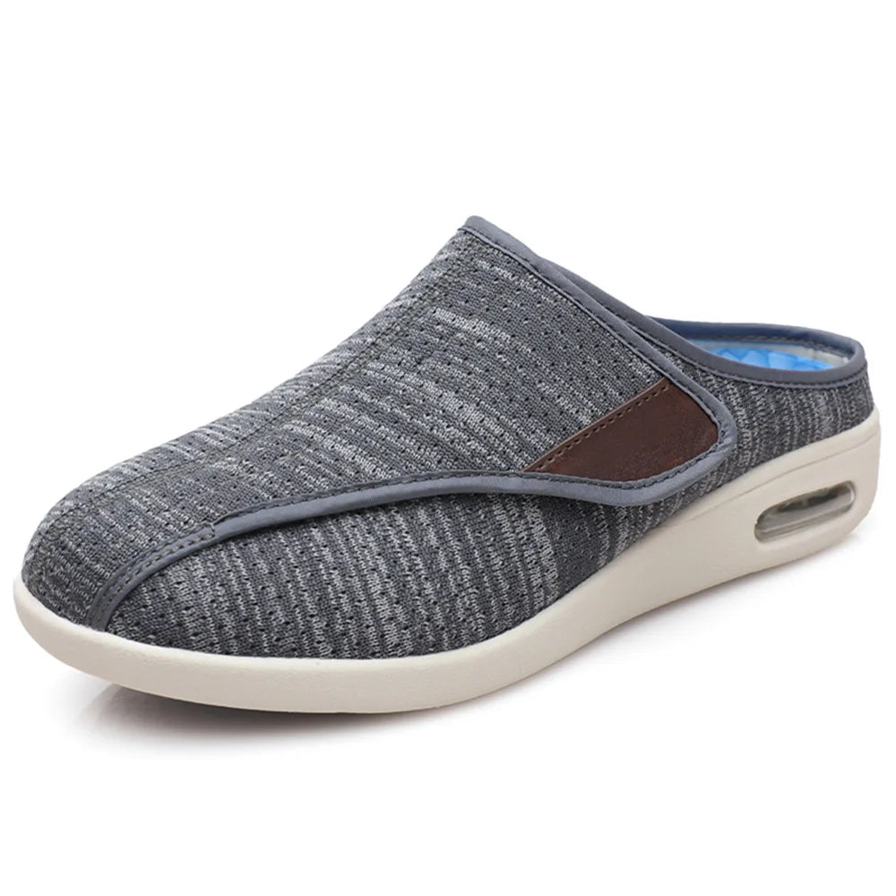Orthopädische Mules mit Klettverschluss aus meliertem Mesh in Schwarz