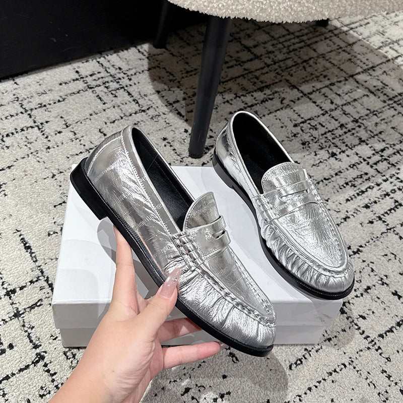Penny Loafer Damen glatte Lederoptik in Braun, Seitenprofil