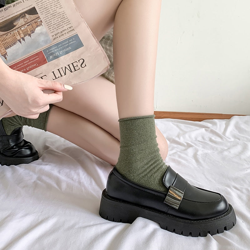 Schwarze Plateau-Loafer im britischen Stil für Damen